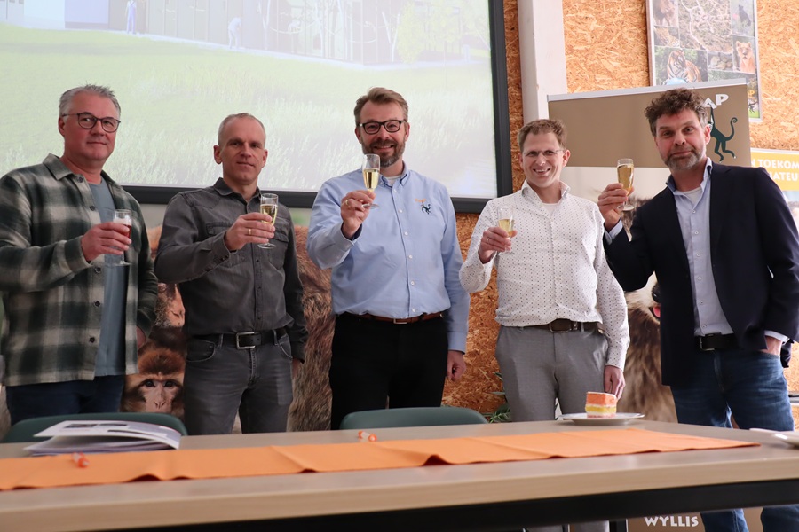 Group of people raising a glass