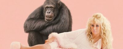 Women with a chimpanzee